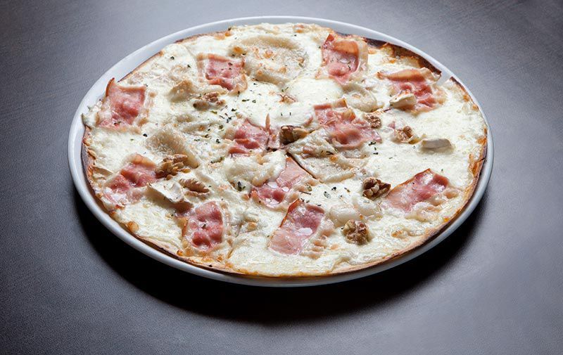 Pizza de jamón y queso